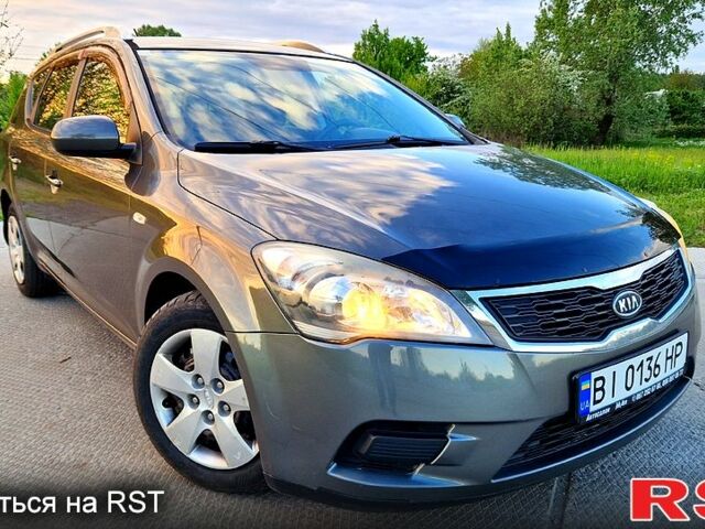 Серый Киа Сид, объемом двигателя 1.4 л и пробегом 206 тыс. км за 5250 $, фото 1 на Automoto.ua