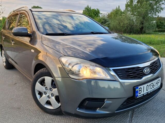 Серый Киа Сид, объемом двигателя 1.4 л и пробегом 206 тыс. км за 5250 $, фото 1 на Automoto.ua