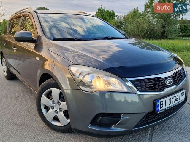 Серый Киа Сид, объемом двигателя 1.4 л и пробегом 206 тыс. км за 5350 $, фото 1 на Automoto.ua