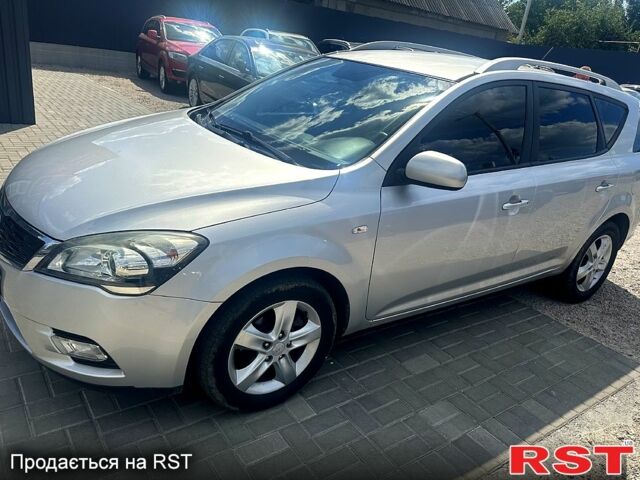 Серый Киа Сид, объемом двигателя 1.4 л и пробегом 200 тыс. км за 7800 $, фото 1 на Automoto.ua