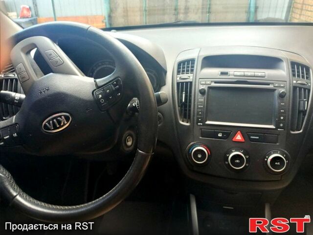Серый Киа Сид, объемом двигателя 1.4 л и пробегом 203 тыс. км за 7990 $, фото 1 на Automoto.ua