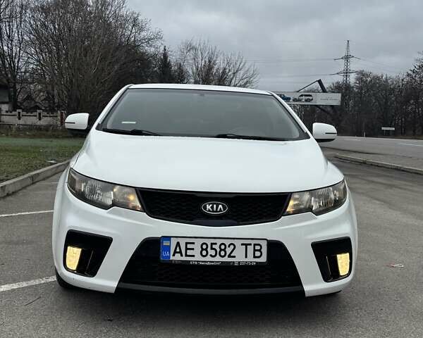 Білий Кіа Cerato KOUP, об'ємом двигуна 2 л та пробігом 174 тис. км за 8500 $, фото 1 на Automoto.ua