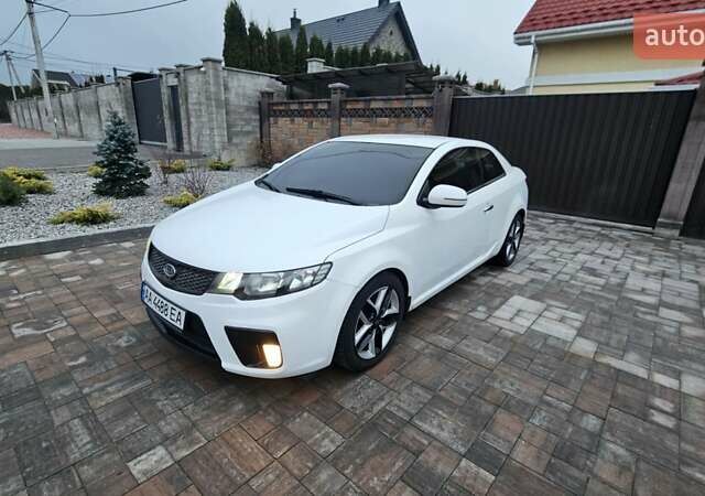 Белый Киа Cerato KOUP, объемом двигателя 2 л и пробегом 138 тыс. км за 8300 $, фото 1 на Automoto.ua