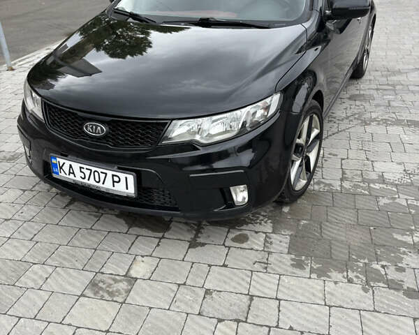 Черный Киа Cerato KOUP, объемом двигателя 2 л и пробегом 204 тыс. км за 8000 $, фото 1 на Automoto.ua