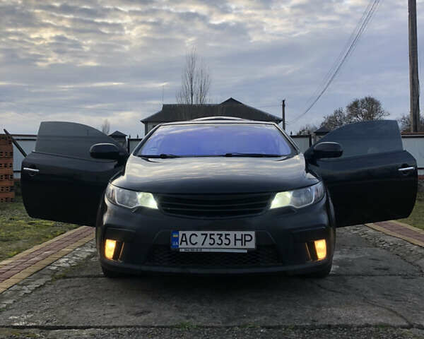 Черный Киа Cerato KOUP, объемом двигателя 2 л и пробегом 230 тыс. км за 8000 $, фото 1 на Automoto.ua