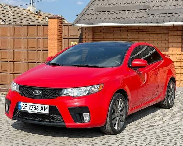 Червоний Кіа Cerato KOUP, об'ємом двигуна 2.4 л та пробігом 182 тис. км за 8500 $, фото 1 на Automoto.ua