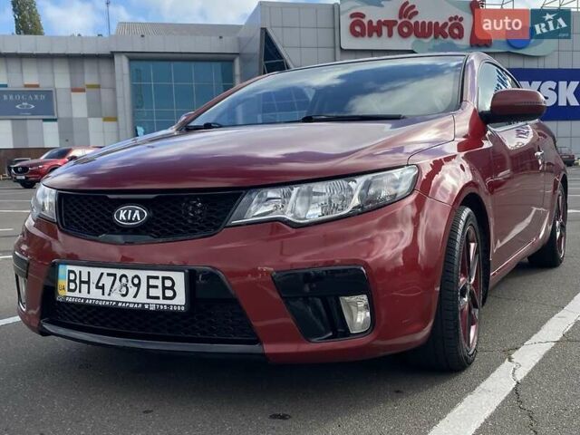 Красный Киа Cerato KOUP, объемом двигателя 2 л и пробегом 107 тыс. км за 10200 $, фото 1 на Automoto.ua