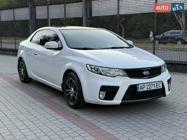 Білий Кіа Черато, об'ємом двигуна 2 л та пробігом 165 тис. км за 8200 $, фото 1 на Automoto.ua