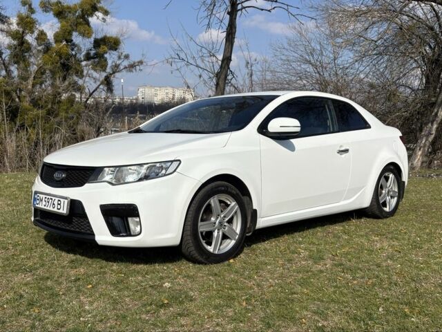 Білий Кіа Черато, об'ємом двигуна 2 л та пробігом 186 тис. км за 7450 $, фото 1 на Automoto.ua