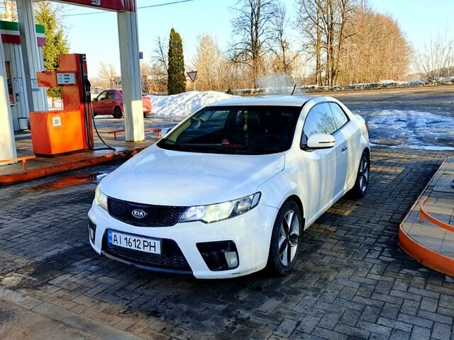 Білий Кіа Черато, об'ємом двигуна 2 л та пробігом 177 тис. км за 8100 $, фото 1 на Automoto.ua