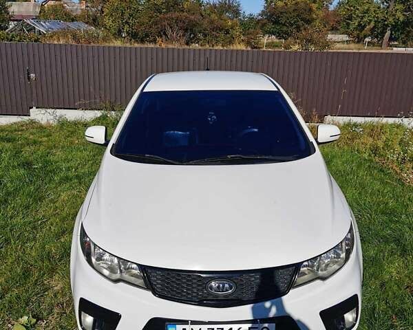 Білий Кіа Черато, об'ємом двигуна 2 л та пробігом 139 тис. км за 9800 $, фото 1 на Automoto.ua