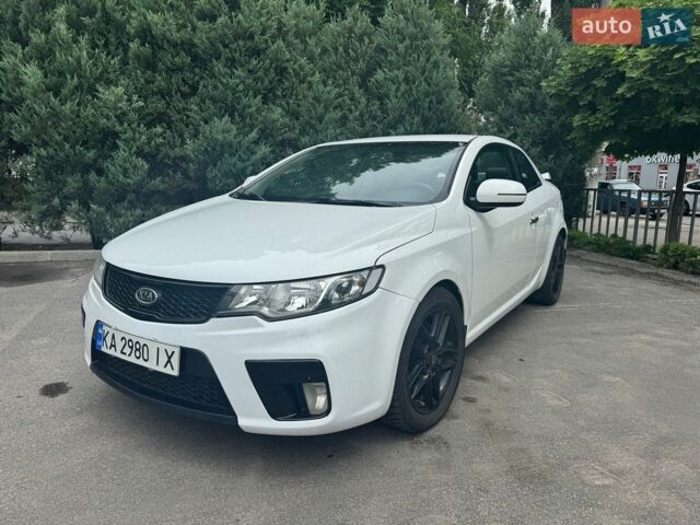 Белый Киа Черато, объемом двигателя 2 л и пробегом 200 тыс. км за 7000 $, фото 1 на Automoto.ua