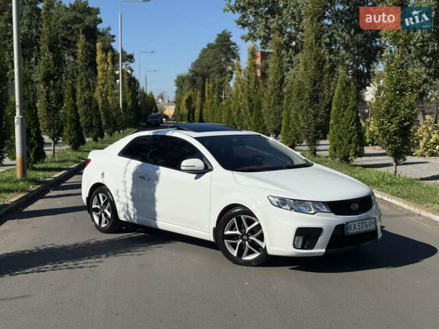 Белый Киа Черато, объемом двигателя 2 л и пробегом 110 тыс. км за 9500 $, фото 1 на Automoto.ua