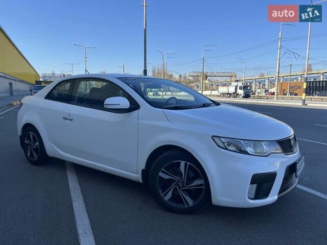 Білий Кіа Черато, об'ємом двигуна 2 л та пробігом 235 тис. км за 7700 $, фото 1 на Automoto.ua