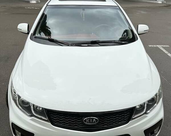 Білий Кіа Черато, об'ємом двигуна 2 л та пробігом 144 тис. км за 9600 $, фото 1 на Automoto.ua