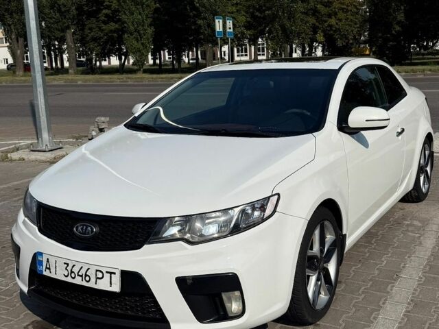 Белый Киа Черато, объемом двигателя 2 л и пробегом 290 тыс. км за 7700 $, фото 1 на Automoto.ua