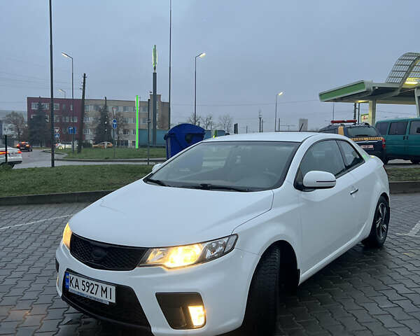 Белый Киа Черато, объемом двигателя 2 л и пробегом 236 тыс. км за 9000 $, фото 1 на Automoto.ua