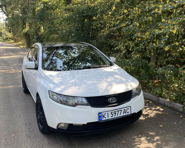 Білий Кіа Черато, об'ємом двигуна 1.6 л та пробігом 168 тис. км за 5800 $, фото 1 на Automoto.ua
