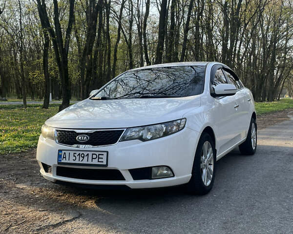 Білий Кіа Черато, об'ємом двигуна 1.59 л та пробігом 164 тис. км за 8800 $, фото 1 на Automoto.ua