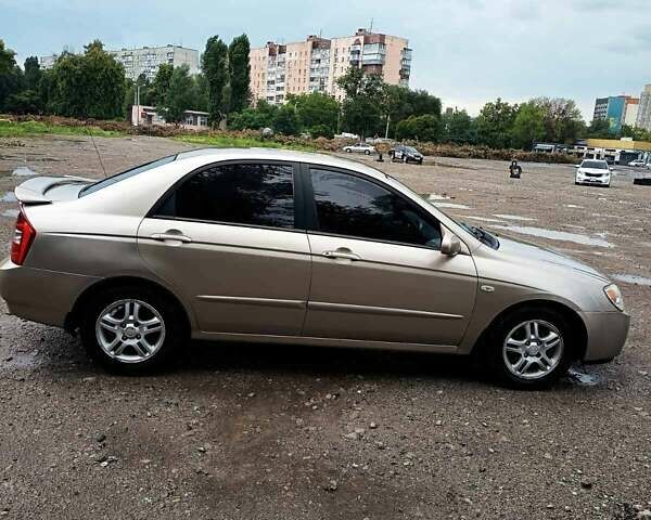Бежевий Кіа Черато, об'ємом двигуна 2 л та пробігом 187 тис. км за 4700 $, фото 1 на Automoto.ua