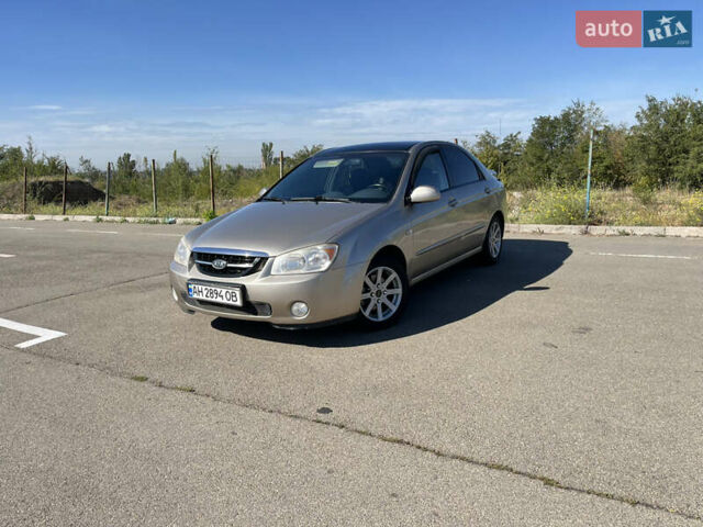 Бежевый Киа Черато, объемом двигателя 2 л и пробегом 160 тыс. км за 4400 $, фото 1 на Automoto.ua