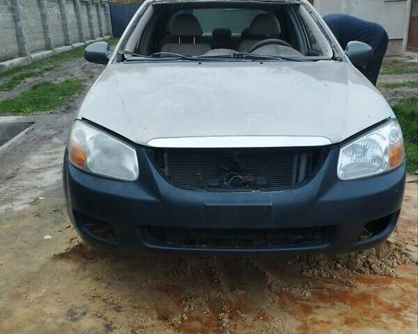 Бежевый Киа Черато, объемом двигателя 1.59 л и пробегом 208 тыс. км за 1900 $, фото 1 на Automoto.ua