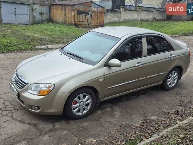 Бежевый Киа Черато, объемом двигателя 2 л и пробегом 210 тыс. км за 5300 $, фото 1 на Automoto.ua