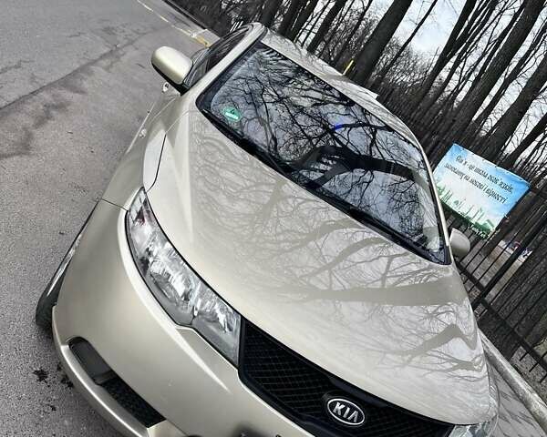 Бежевий Кіа Черато, об'ємом двигуна 1.59 л та пробігом 184 тис. км за 7700 $, фото 1 на Automoto.ua
