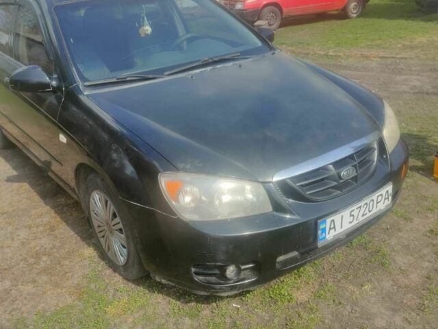 Чорний Кіа Черато, об'ємом двигуна 2 л та пробігом 1000 тис. км за 2200 $, фото 1 на Automoto.ua