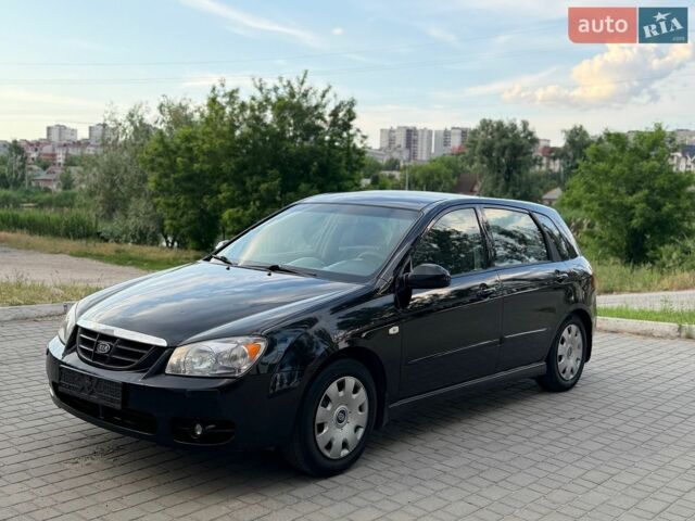 Черный Киа Черато, объемом двигателя 2 л и пробегом 197 тыс. км за 3900 $, фото 1 на Automoto.ua