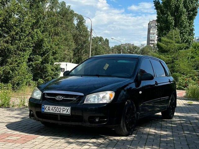 Чорний Кіа Черато, об'ємом двигуна 1.6 л та пробігом 206 тис. км за 3800 $, фото 1 на Automoto.ua