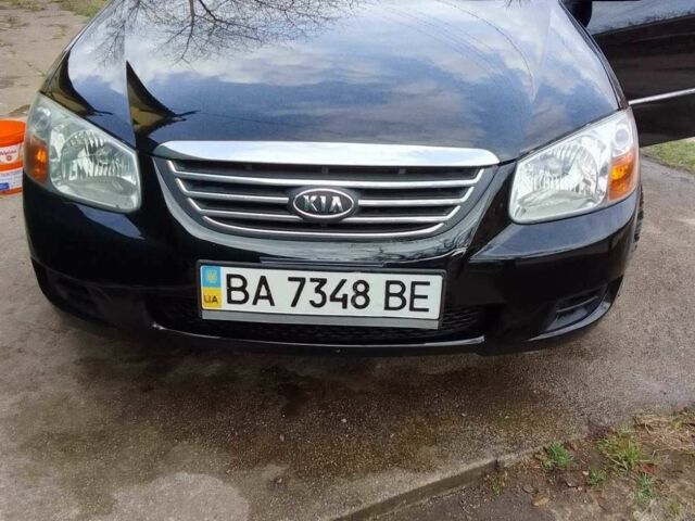 Черный Киа Черато, объемом двигателя 1.6 л и пробегом 213 тыс. км за 5000 $, фото 1 на Automoto.ua