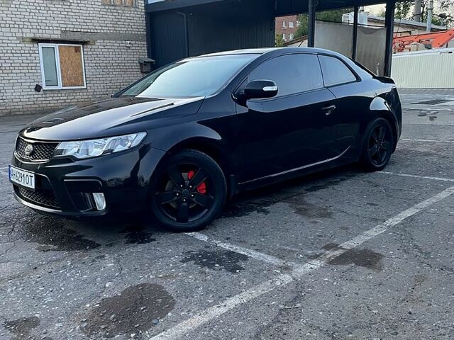 Черный Киа Черато, объемом двигателя 1.6 л и пробегом 243 тыс. км за 7200 $, фото 1 на Automoto.ua