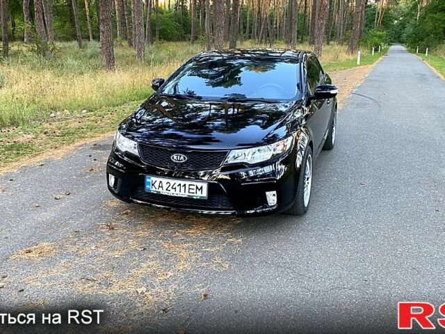 Чорний Кіа Черато, об'ємом двигуна 1.6 л та пробігом 125 тис. км за 8000 $, фото 1 на Automoto.ua
