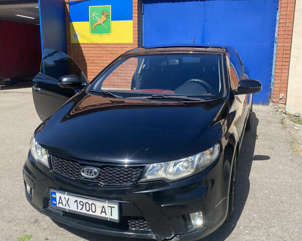 Черный Киа Черато, объемом двигателя 2 л и пробегом 99 тыс. км за 7000 $, фото 1 на Automoto.ua