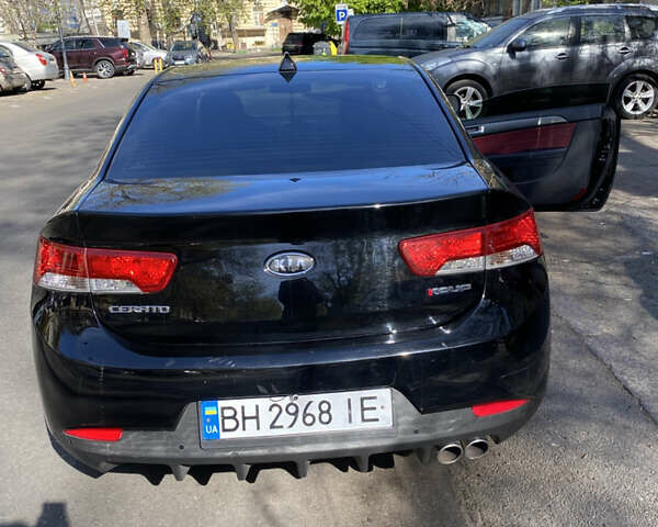 Черный Киа Черато, объемом двигателя 2 л и пробегом 99 тыс. км за 10600 $, фото 1 на Automoto.ua