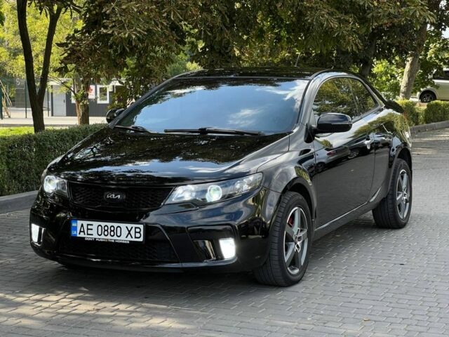 Чорний Кіа Черато, об'ємом двигуна 2 л та пробігом 185 тис. км за 8700 $, фото 1 на Automoto.ua