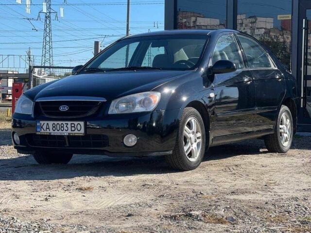 Черный Киа Черато, объемом двигателя 2 л и пробегом 268 тыс. км за 4200 $, фото 1 на Automoto.ua