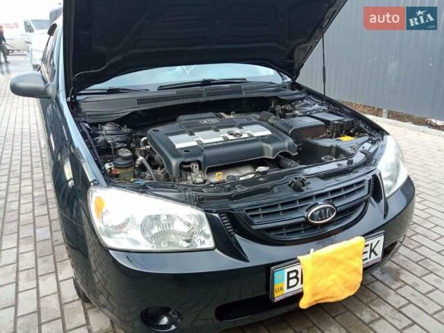 Черный Киа Черато, объемом двигателя 1.6 л и пробегом 220 тыс. км за 5400 $, фото 1 на Automoto.ua