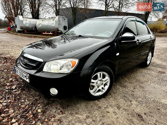 Чорний Кіа Черато, об'ємом двигуна 1.98 л та пробігом 240 тис. км за 5100 $, фото 1 на Automoto.ua