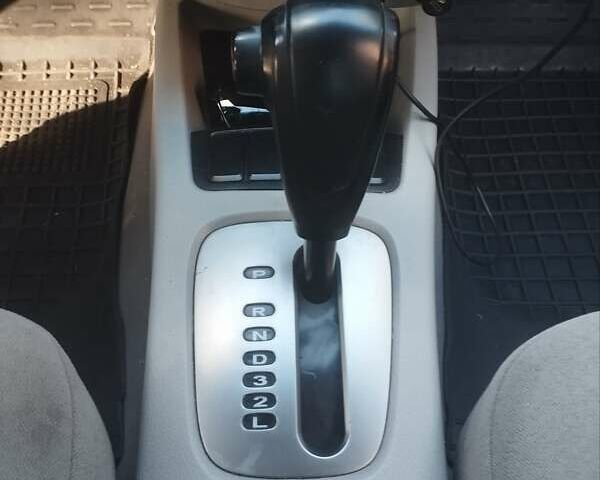 Черный Киа Черато, объемом двигателя 2 л и пробегом 220 тыс. км за 4900 $, фото 1 на Automoto.ua