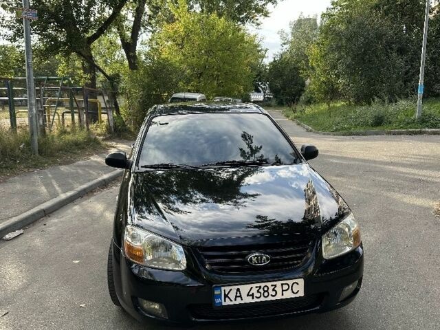 Черный Киа Черато, объемом двигателя 1.6 л и пробегом 181 тыс. км за 3900 $, фото 1 на Automoto.ua