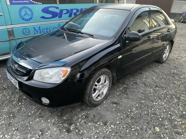 Черный Киа Черато, объемом двигателя 2 л и пробегом 240 тыс. км за 3300 $, фото 1 на Automoto.ua