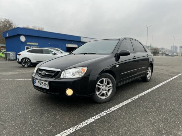 Черный Киа Черато, объемом двигателя 1.6 л и пробегом 230 тыс. км за 3200 $, фото 1 на Automoto.ua