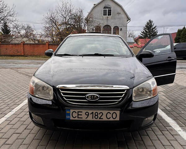 Черный Киа Черато, объемом двигателя 1.6 л и пробегом 232 тыс. км за 4300 $, фото 1 на Automoto.ua