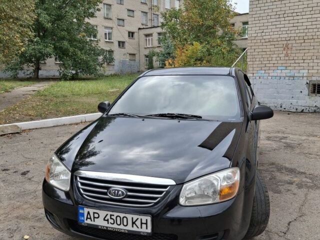 Черный Киа Черато, объемом двигателя 1.6 л и пробегом 182 тыс. км за 5000 $, фото 1 на Automoto.ua