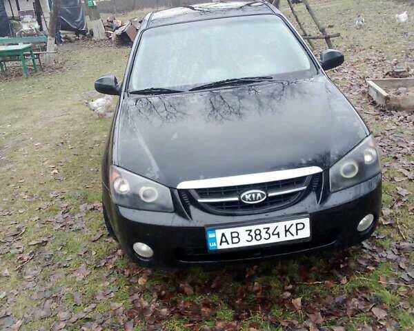 Черный Киа Черато, объемом двигателя 2 л и пробегом 240 тыс. км за 4200 $, фото 1 на Automoto.ua