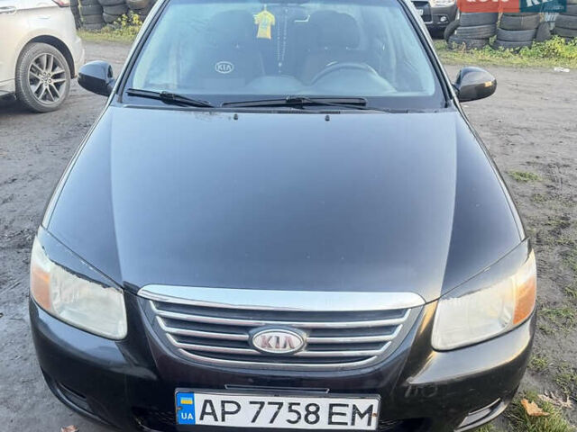 Чорний Кіа Черато, об'ємом двигуна 1.59 л та пробігом 250 тис. км за 4300 $, фото 1 на Automoto.ua