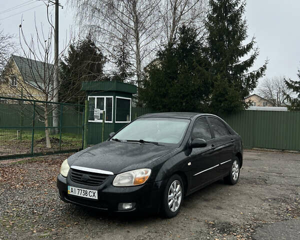 Черный Киа Черато, объемом двигателя 1.59 л и пробегом 273 тыс. км за 2999 $, фото 1 на Automoto.ua