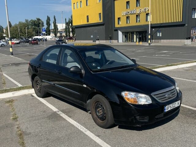 Черный Киа Черато, объемом двигателя 1.6 л и пробегом 172 тыс. км за 3400 $, фото 1 на Automoto.ua